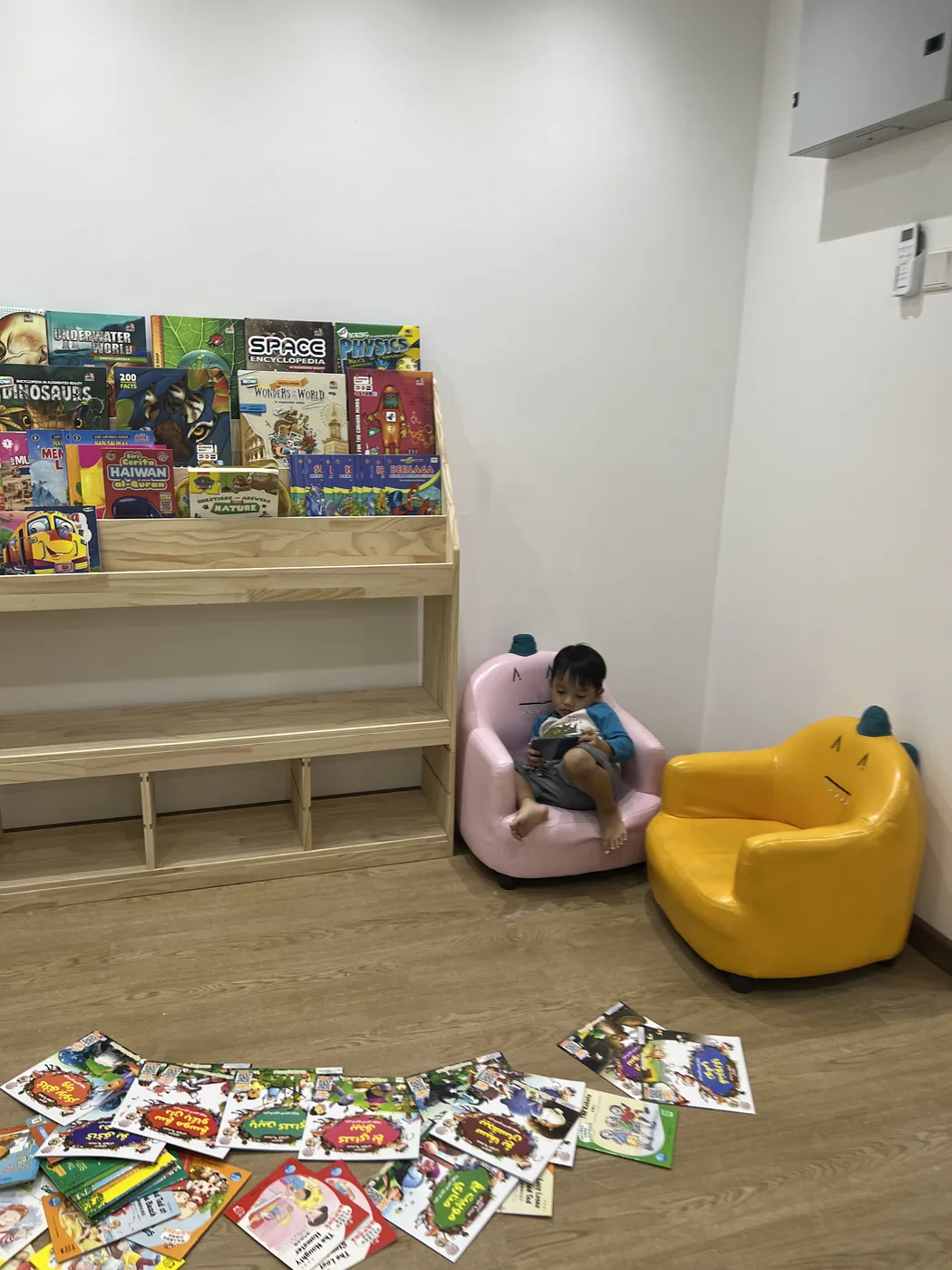 A child-friendly reading corner with books and seating